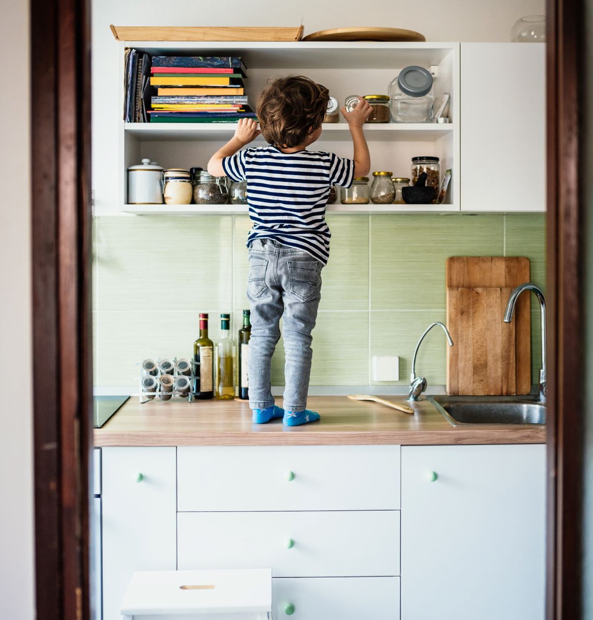 Boy in cupboard