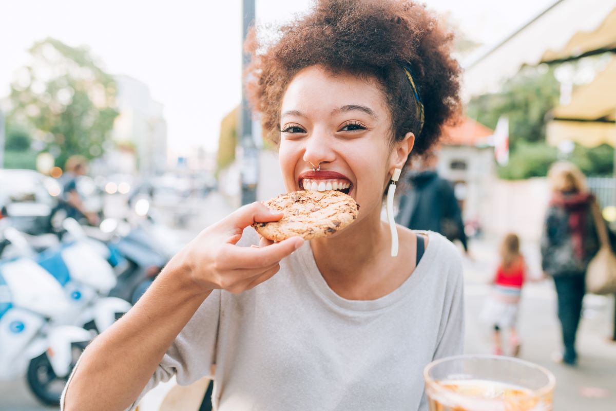 women eating a cookie