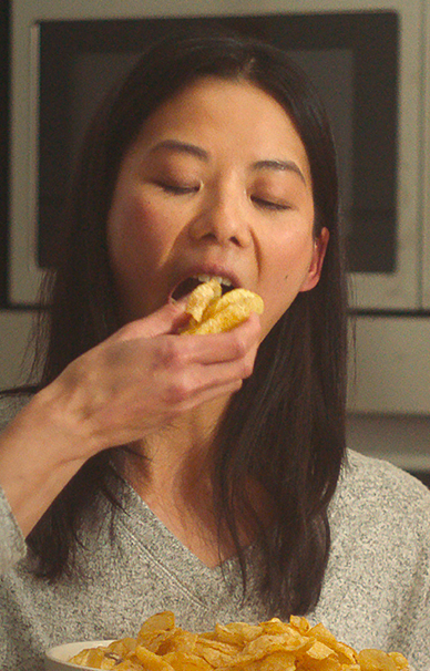 Girl eating chips